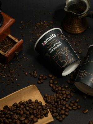 Capture the moment with artisan coffee cups and beans, perfect for cafés and coffee lovers.